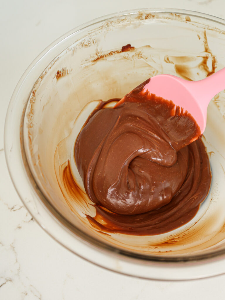 image of chocolate ganache filling for macarons that's been chilled and is ready to be used to fill macarons