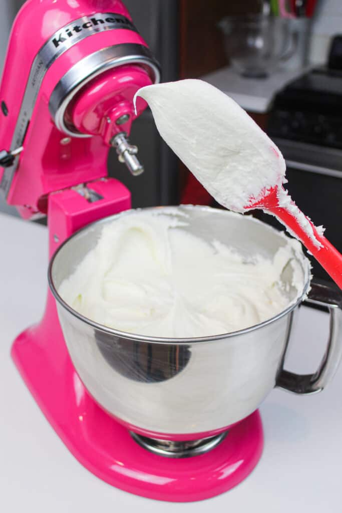 image of buttercream frosting being tested for the right consistency