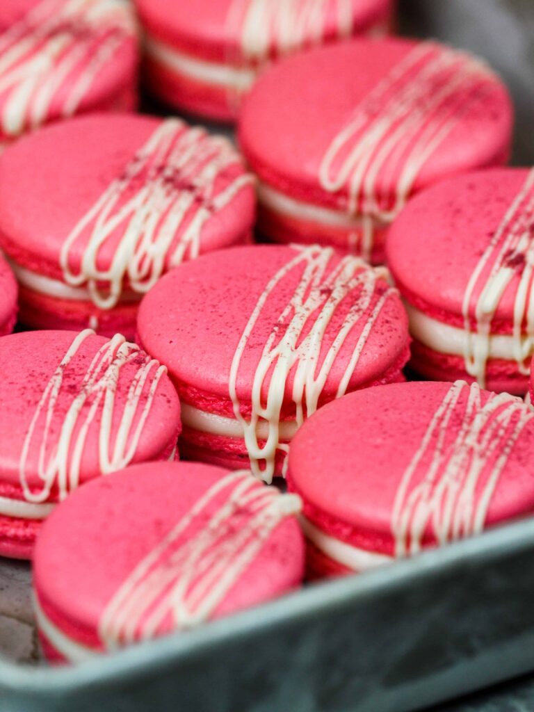 image of french meringue that's been colored pink with gel food coloring to make raspberry macarons
