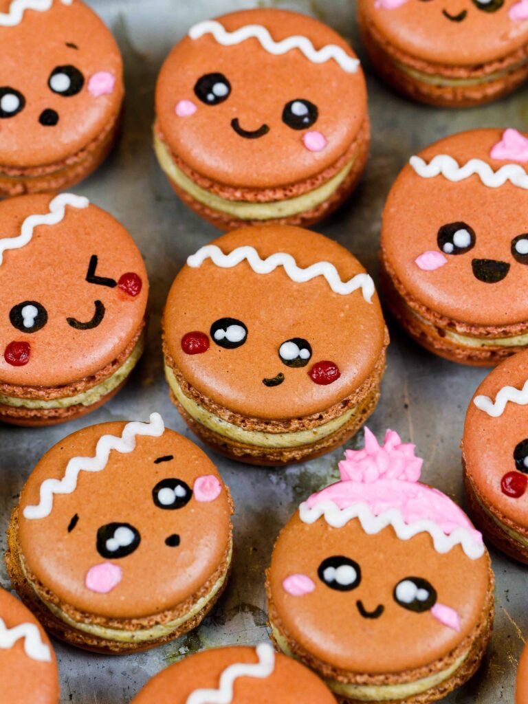 image of gingerbread macarons frosted with gingerbread buttercream