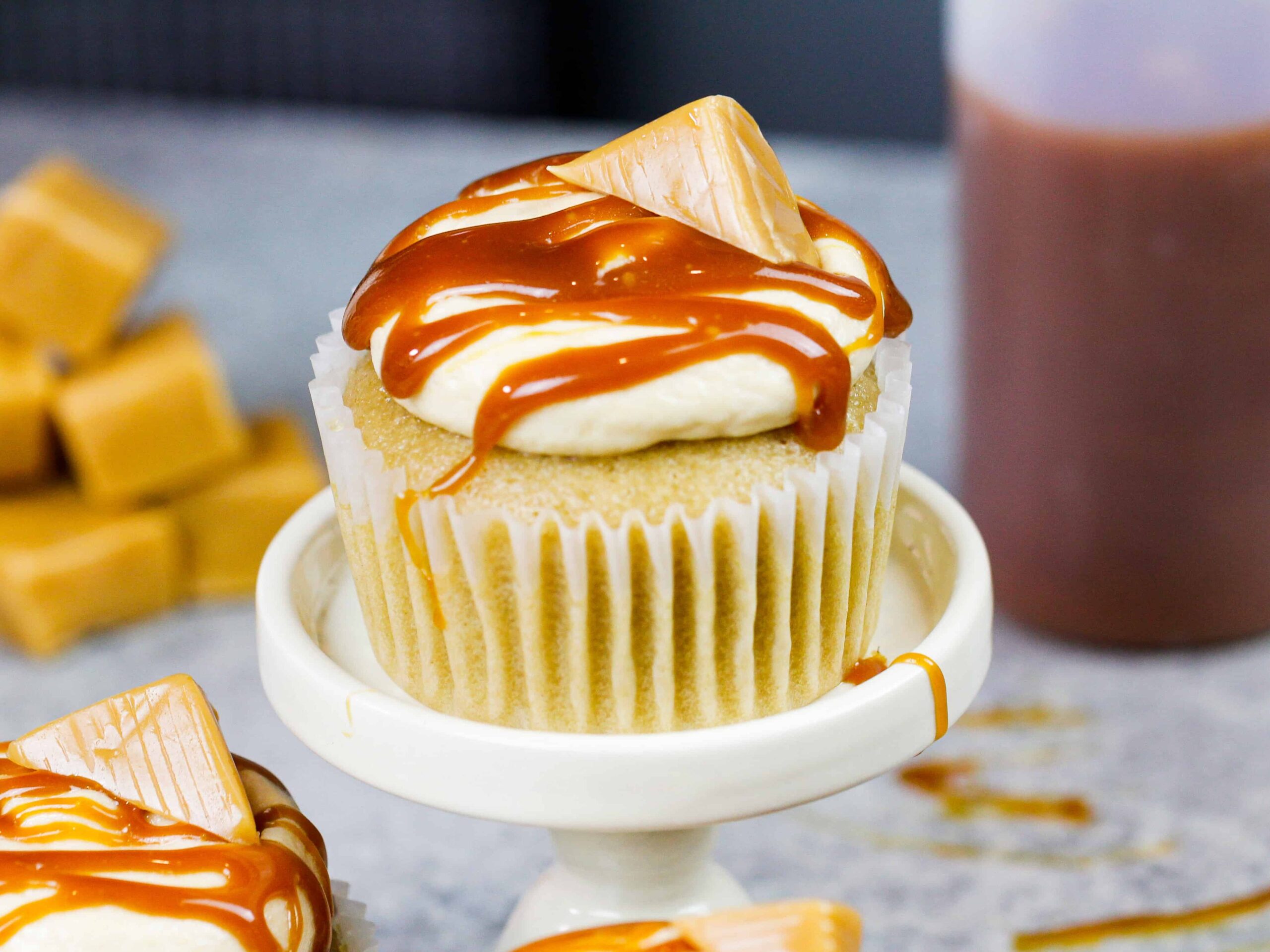 image of a caramel cupcake on a little cupcake stand